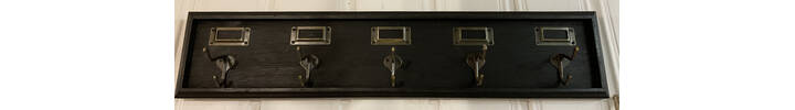Black wooden coat hooks