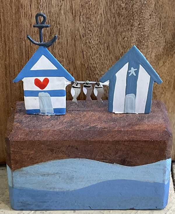 Beachhuts with fish line, wooden seaside decoration 