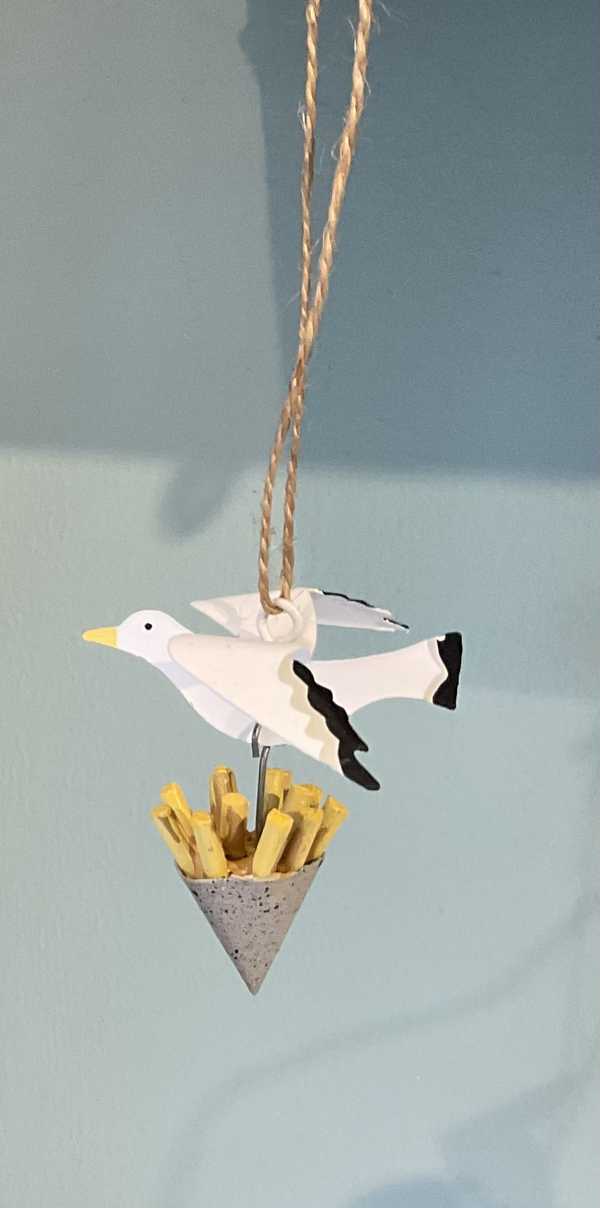 Seagull stealing chips hanging seaside decoration