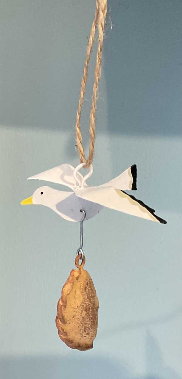 Seagull stealing a pasty hanging seaside decoration 