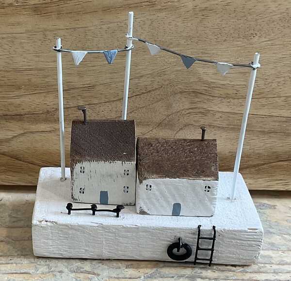 Cottages with bunting seaside decoration