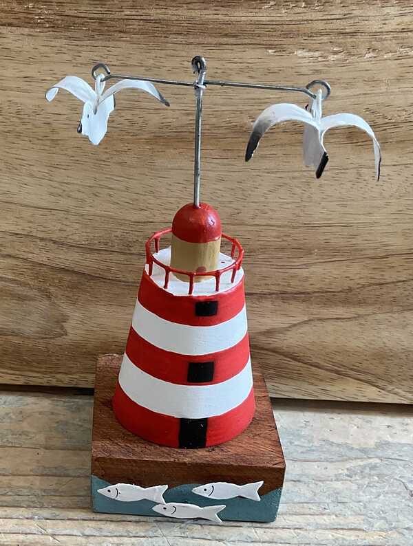 Wooden lighthouse decoration  with seagulls and fish in red