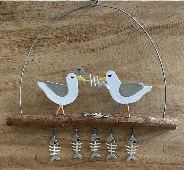 Seagulls with fish bones hanging seaside decoration 