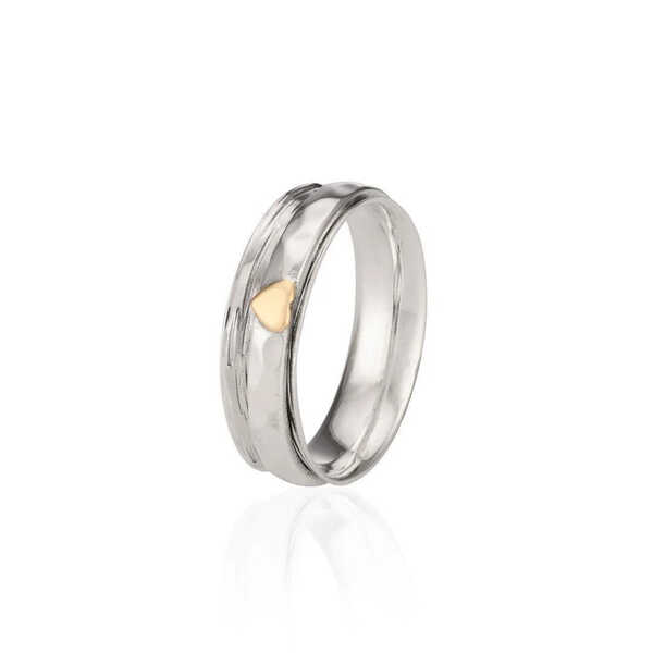 Sterling silver spinning ring with brass heart detail 